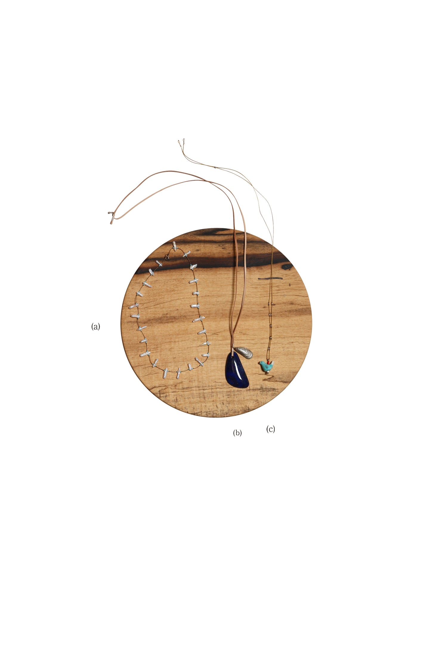 SEE REAL FLOWERS (a)ISLA PEARL NECKLACE (b)LAPIS PENDANT w/SILVER SHELL (c)BIRD SONG NECKLACE
